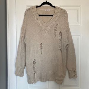 distressed sweater